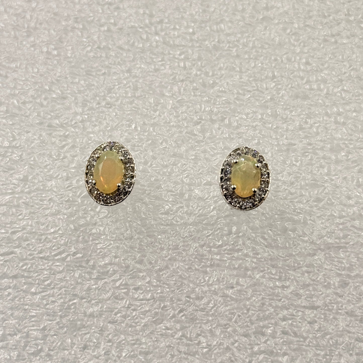 Sterling Silver Halo Oval Ethiopian Opal Post Earrings